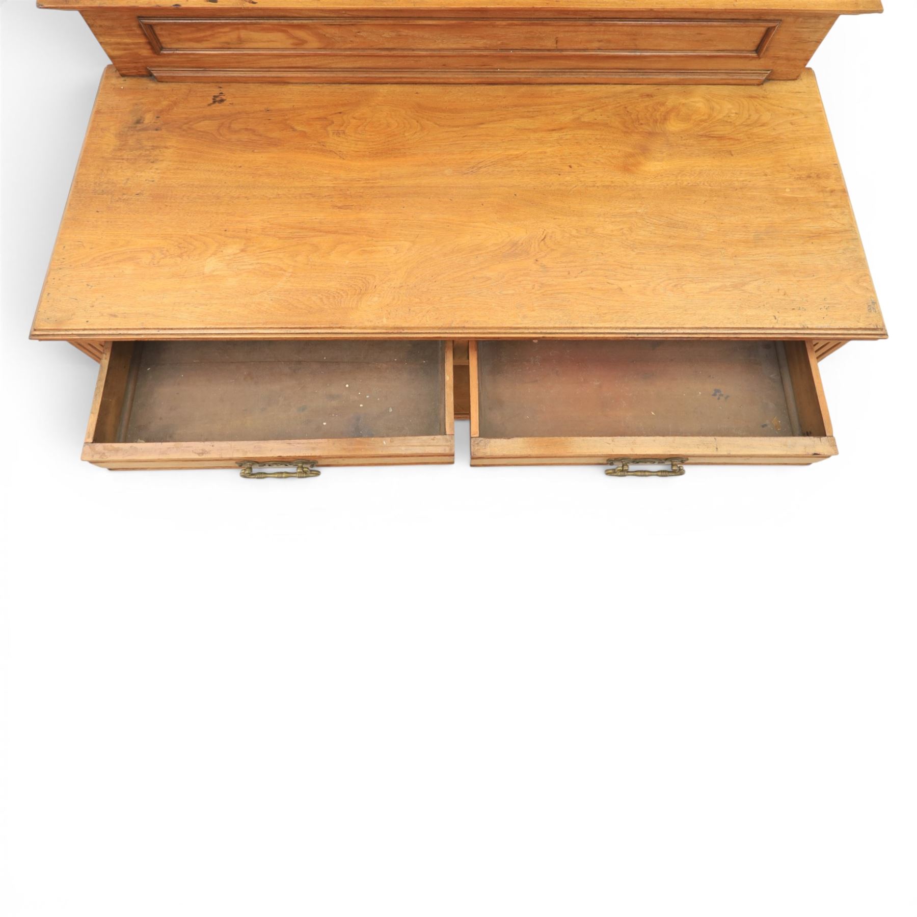 Edwardian oak serving table, raised panelled back over moulded rectangular top, fitted with two frieze drawers with brass drop handles, fluted front uprights, on turned supports united by potboard undertier