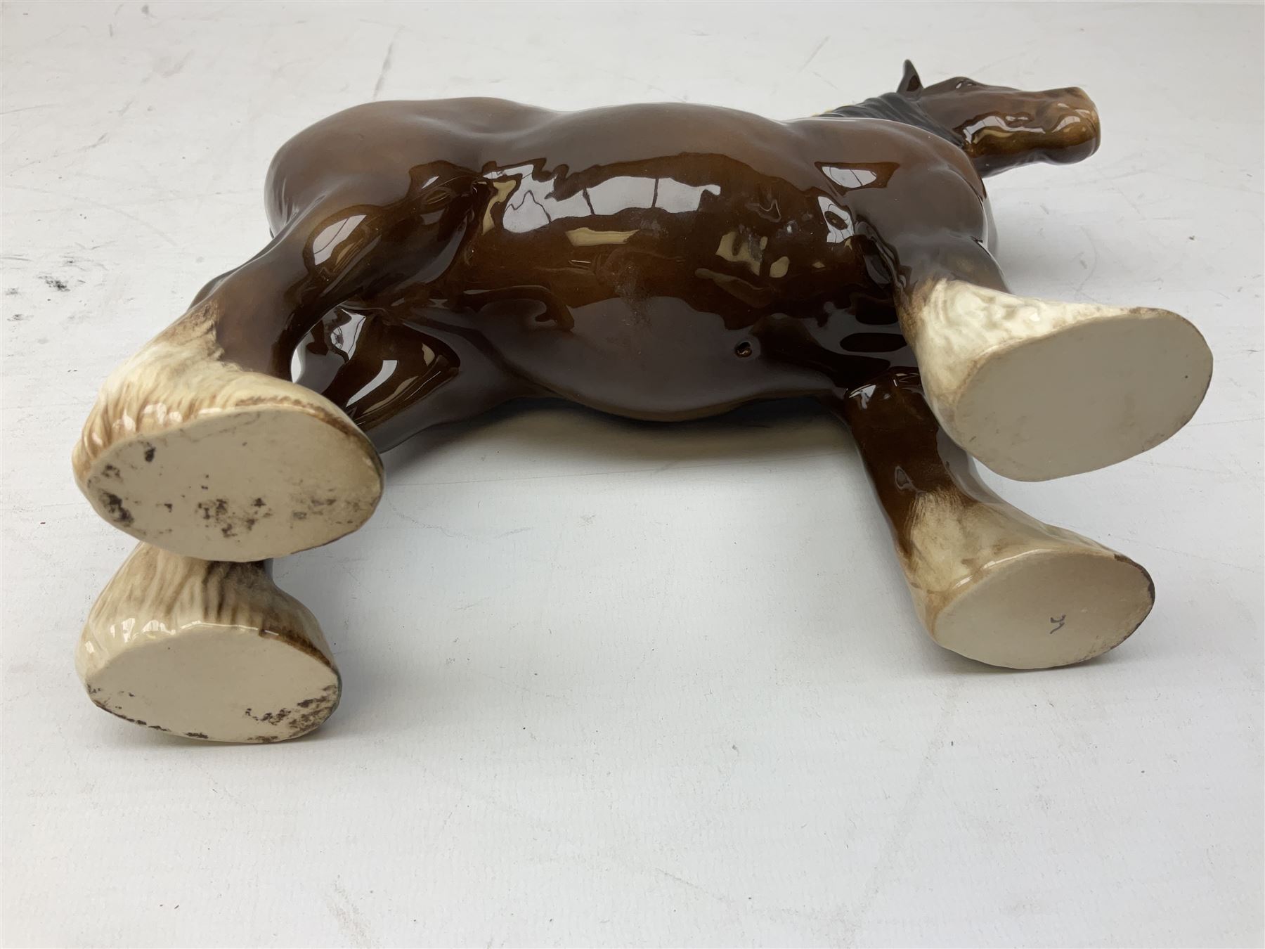 Six Beswick figures of bay horses, including large hunter no.1734, Shire horse no.818, horse with tucked head no.1549, etc (6)