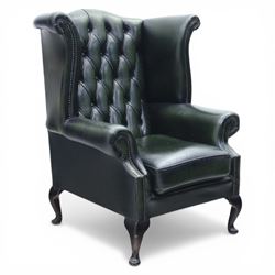 Late 20th century green leather chesterfield style wingback armchair, with deep buttoned b...