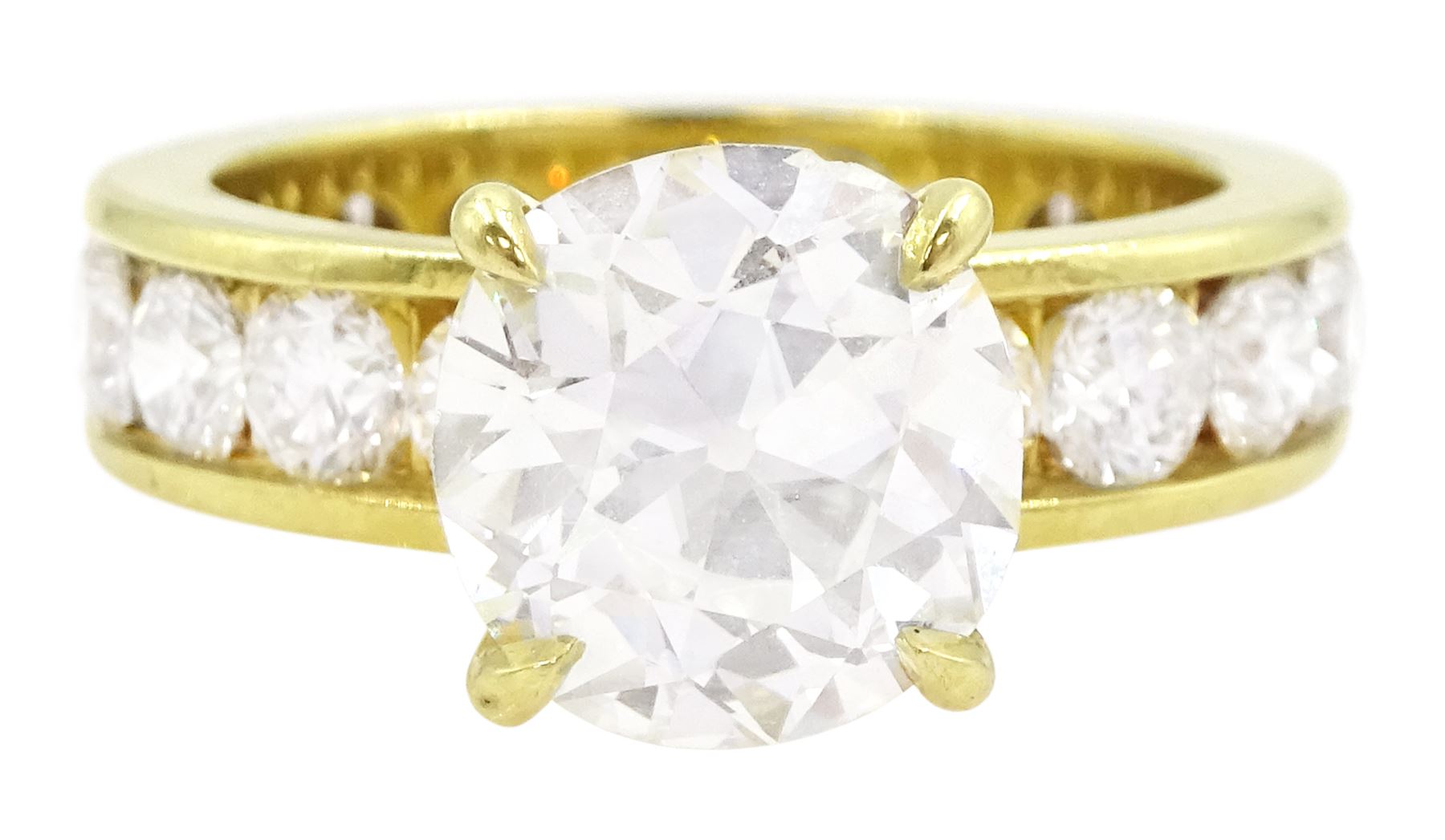18ct gold single stone old cut diamond ring of approx 2.80 carat, with eighteen round brilliant cut diamond set shank of approx 3.00 carat, total diamond weight approx 5.80 carat