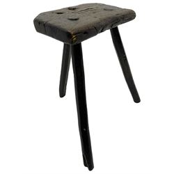 18th century oak three-legged stool, canted rectangular top on three splayed chamfered supports