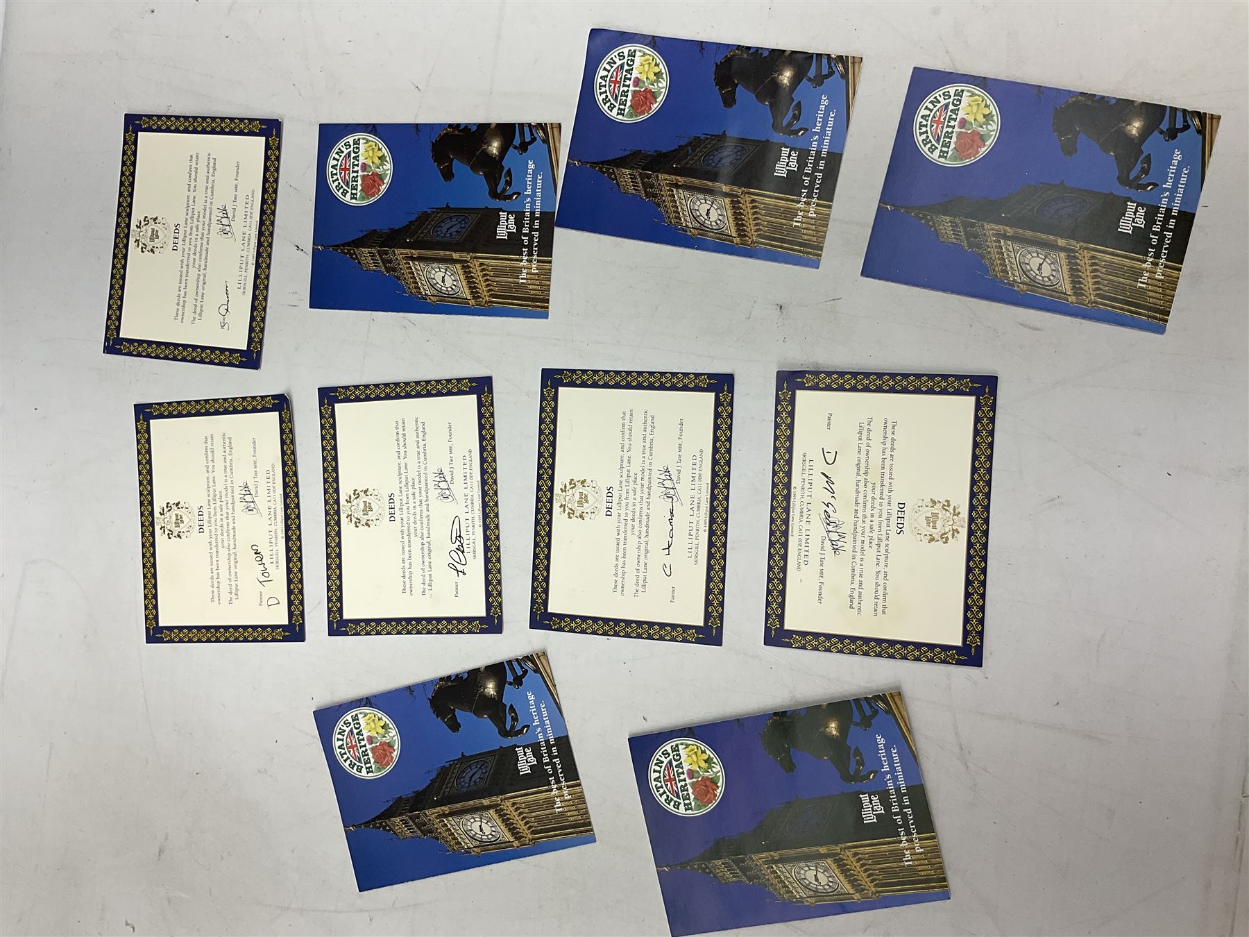 Six Lilliput Lane models from the 'Britain's Heritage' collection, comprising Hampton Court Palace, Tower Bridge, Tower of London, Buckingham Palace, Marble Arch and Big Ben, all boxed