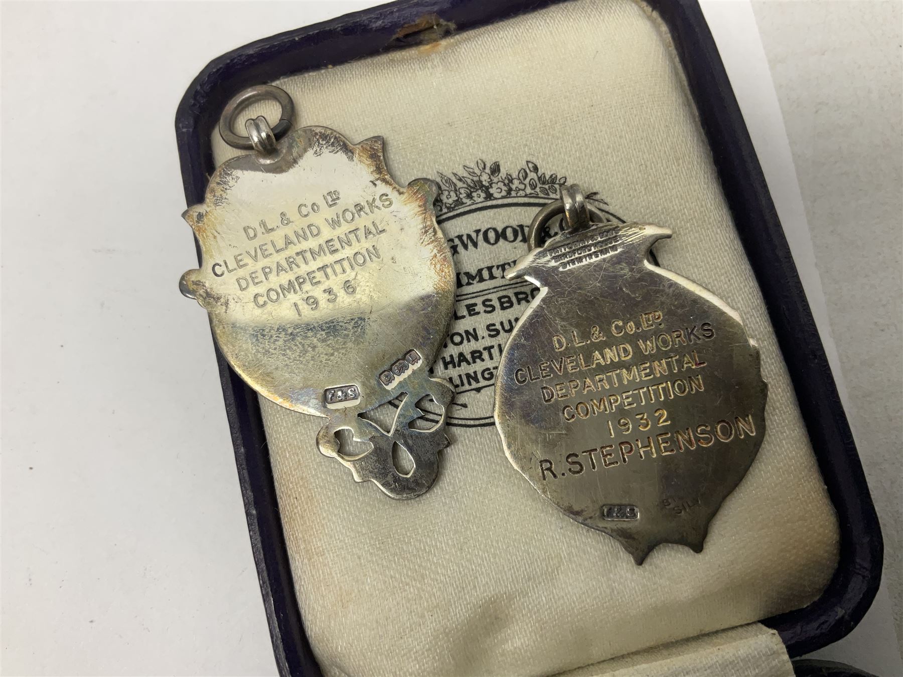 Four St John's silver fobs, together with two silver Directors ...