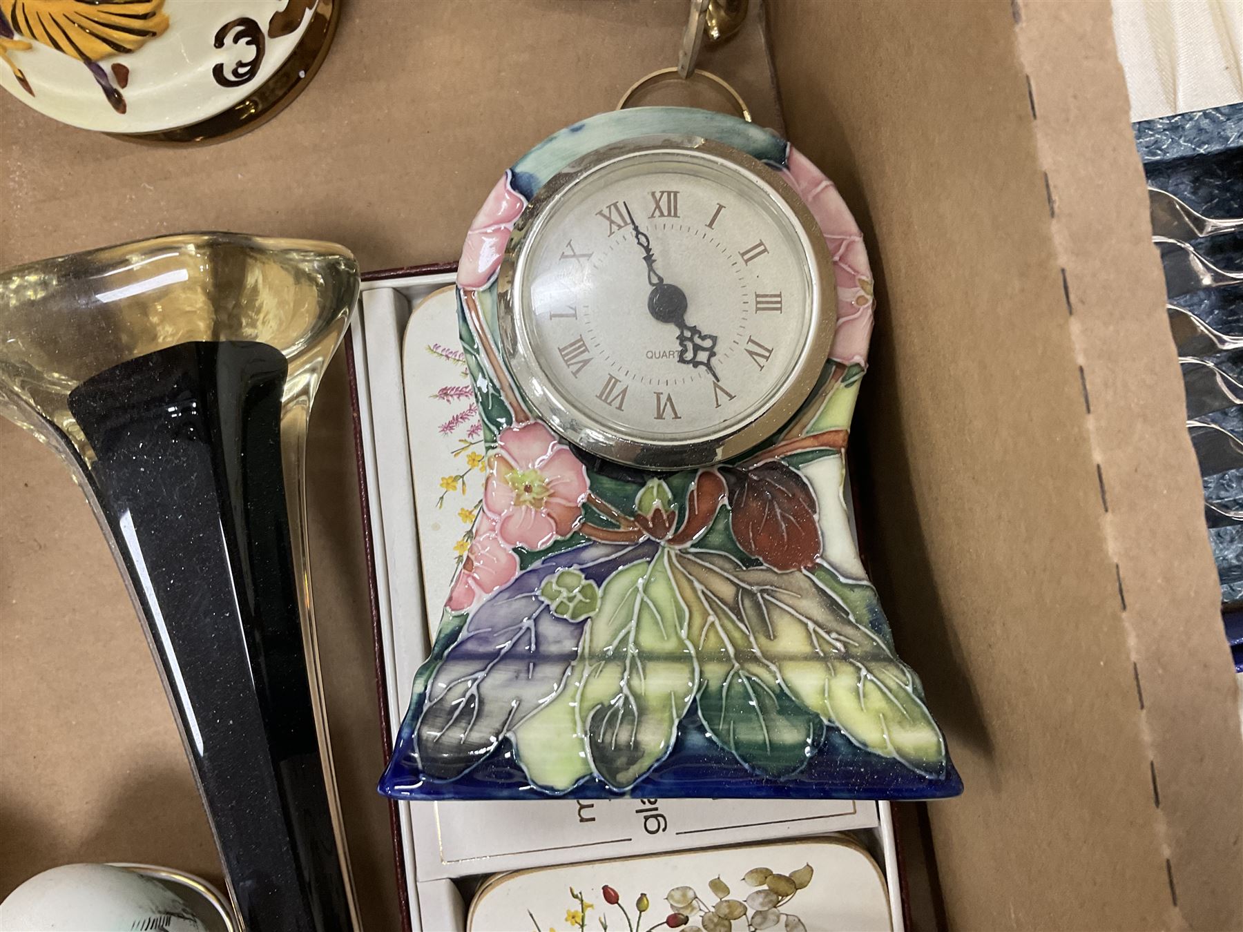 Old Tupton Ware floral decorated mantle clock, Wade Festival jug, Winsor tea wares and other ceramics, together with a collection of silver plate including blue glass lined salts, cutlery sets etc, two boxes 