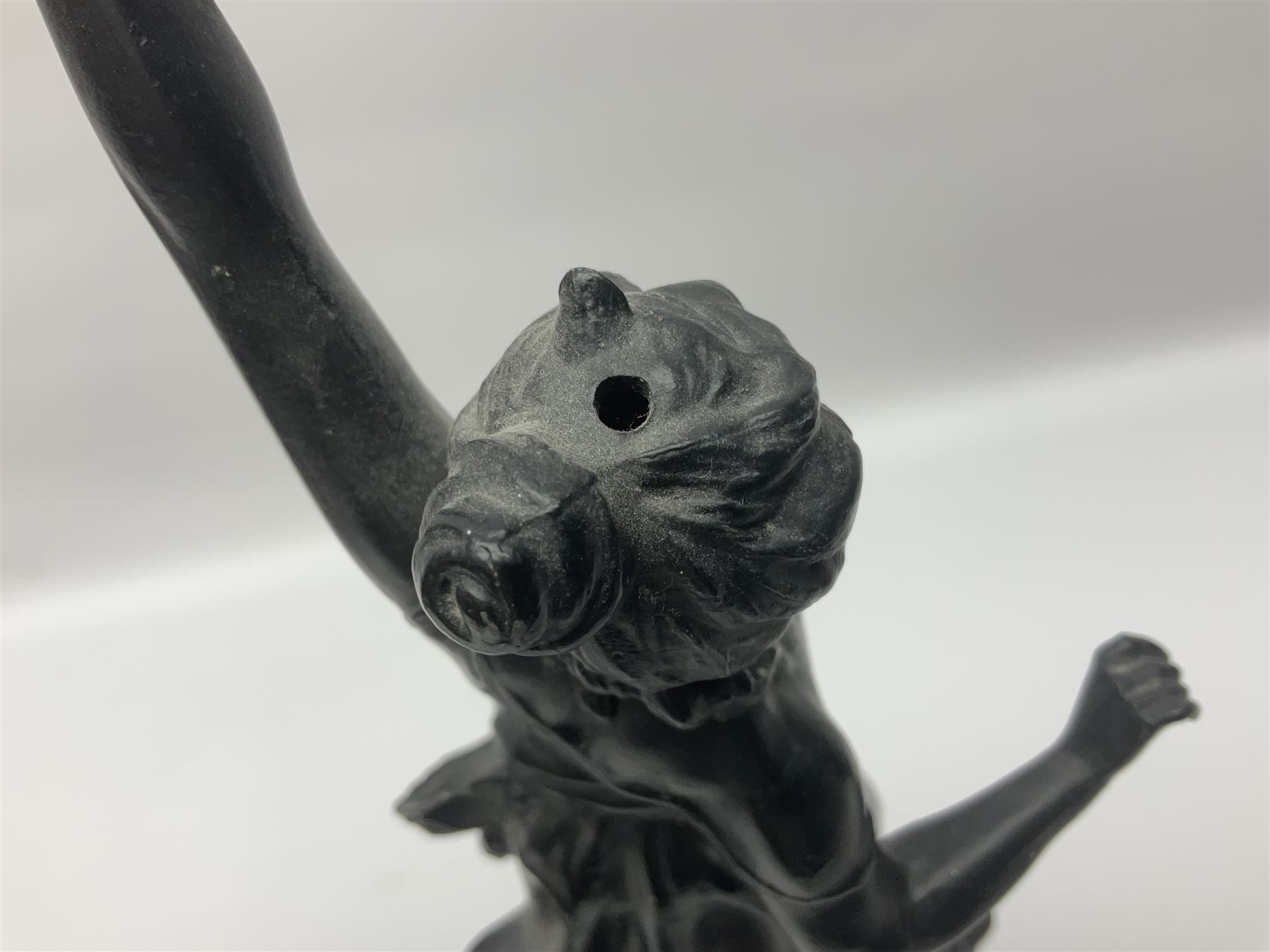 Pair of spelter figures, Le Force and Le Pouvoir, modeled as figures standing on lions, arms held aloft, H51cm 