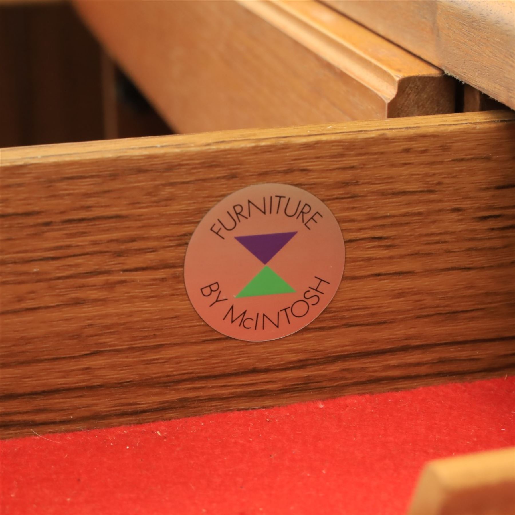 Mid-20th century teak wall display unit, featuring two glazed cupboards and fall front compartment with open shelves, above three drawers and cupboards to the base