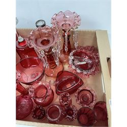 Quantity of cranberry glassware, to include vase with hallmarked silver rim, pair of lustres with waved rim, gilt decoration and drops, various dishes with frilled rims, etc