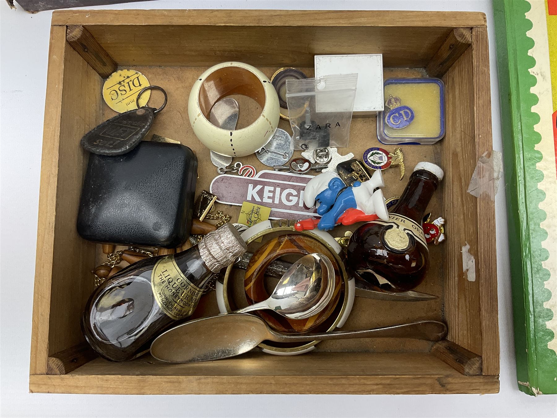 Collection of whimsy figures in a wooden display case, together with other assorted collectables, including stamps, pin badges etc