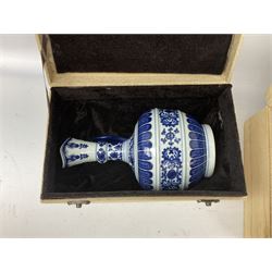 Chinese blue and white ewer painted with floral and stylized panels, together with blue and white bowl, the interior decorated with striped panels below a boarder of waves, ewer H22cm 