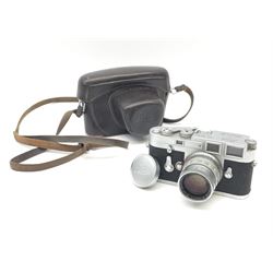 Leica M3 camera body, 1959, chrome finish, serial number '986937', fitted with 'Ernst Leitz GmbH Wetzlar Summicron f=5cm 1:2 Nr.1592614' lens, with Leica M3 instruction booklet