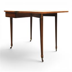 Regency mahogany fold-over tea table, rounded rectangular top with gateleg action, inlaid and crossbanded frieze, raised on squared tapering supports on brass castors