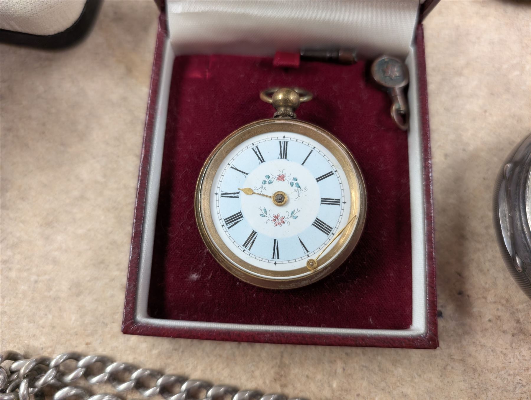 Silver Improved Patent open faced pocket watch, together with a silver Albert chain and a brass fob watch