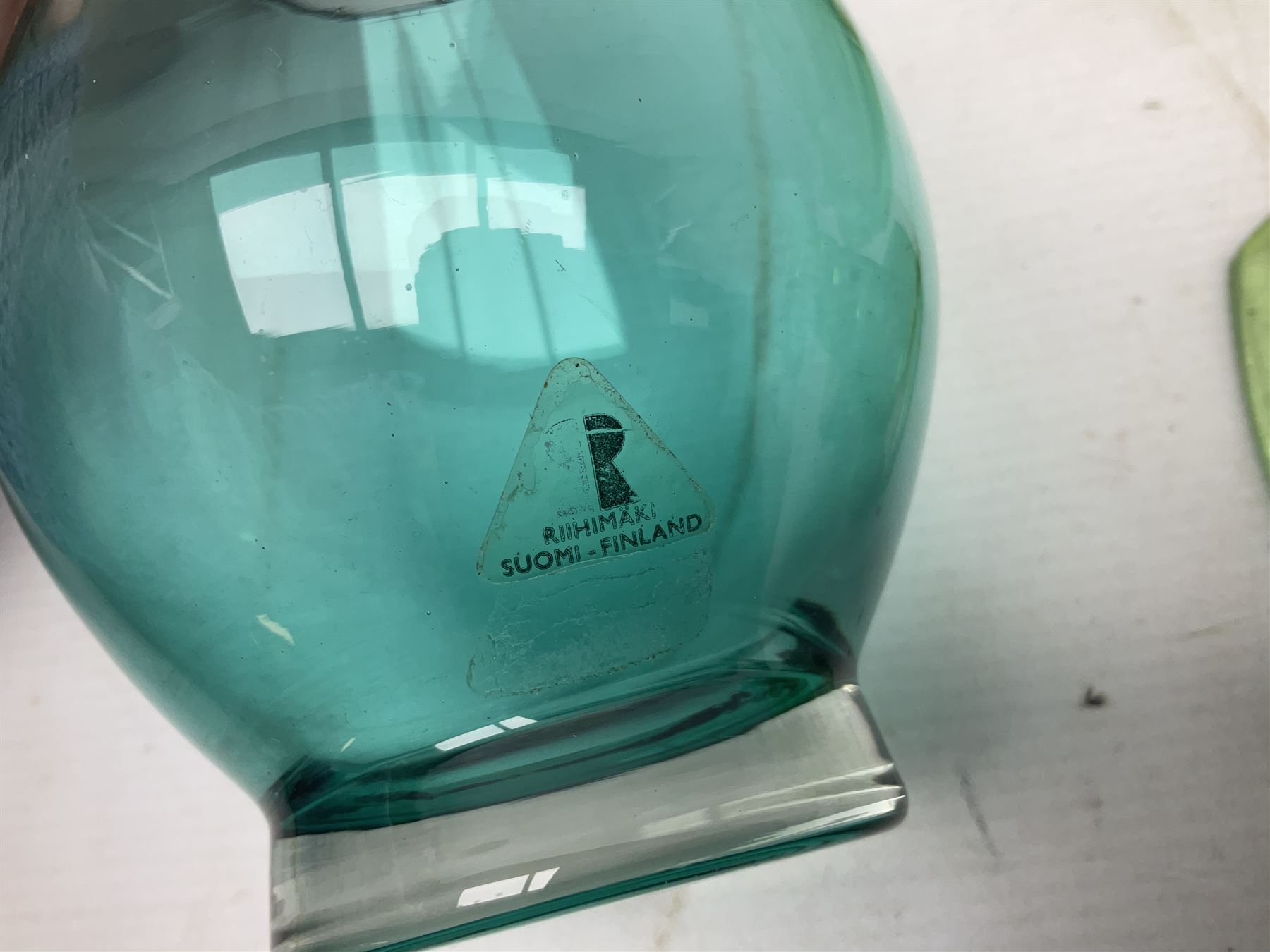 Czech uranium glass dressing table set, comprising twin handled tray, pair of candlesticks, three lidded jars and ring holder dish, and a blue Finnish Riihimäki glass, tray L35cm