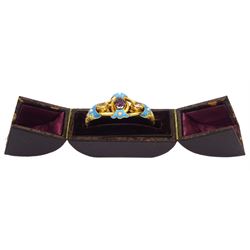 Victorian 18ct gold garnet, topaz, enamel and pearl hinged bangle, the central oval cut rhodolite garnet, set with two imperial topaz's either side and sounded by four enamel and pearl sections, the shoulders with engraved foliate decoration, in velvet and silk lined box