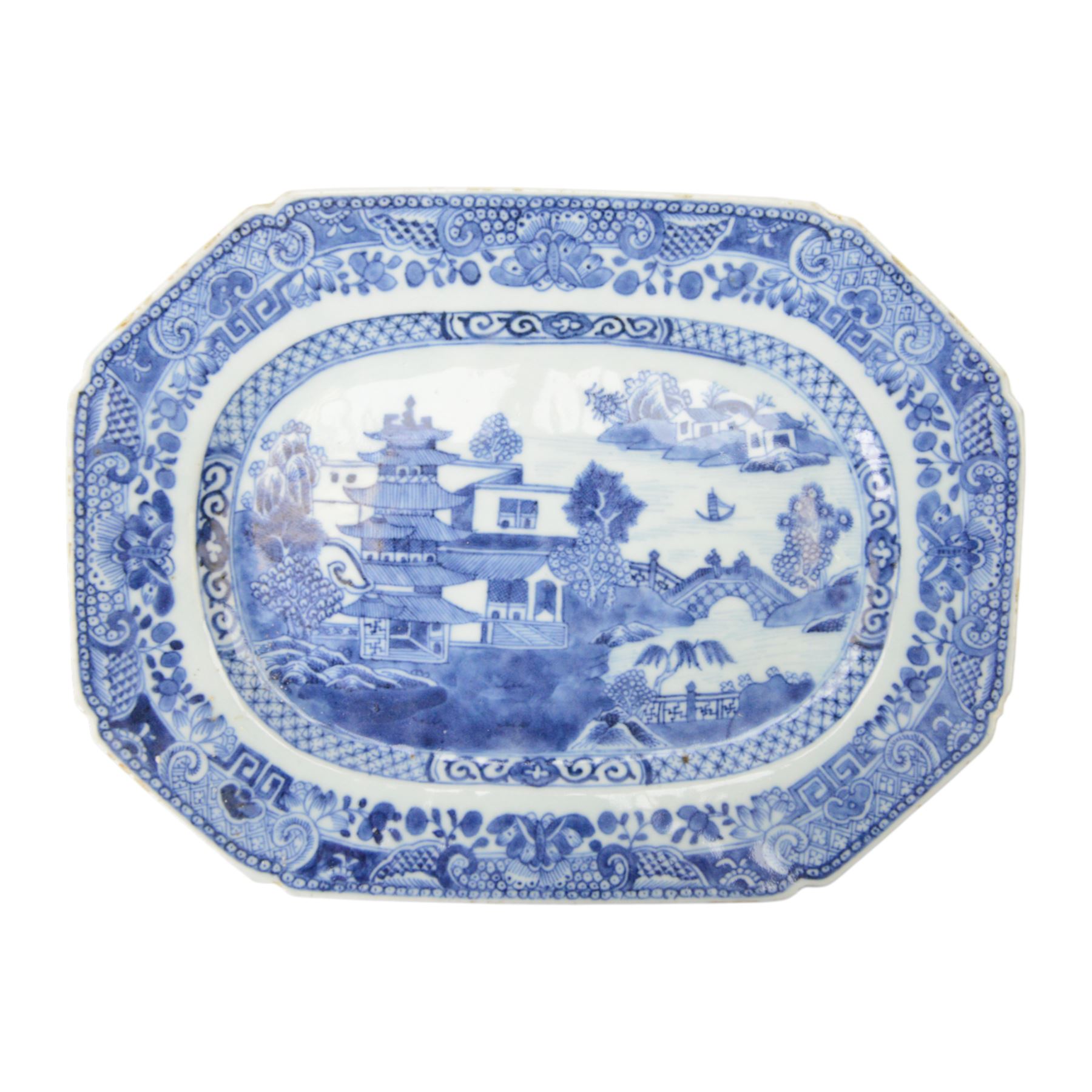 19th century Cantonese plate of octagonal form decorated to the centre with a garden of flowering peonies, together with two other 19th century plates and two serving platters each depicting temples in landscapes, octagonal plate W31cm  