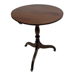 Georgian red walnut tripod table, circular tilt-top with reeded edge, on turned and reed carved vasiform pedestal, three out-splayed supports with further reed moulding, on brass cups and castors