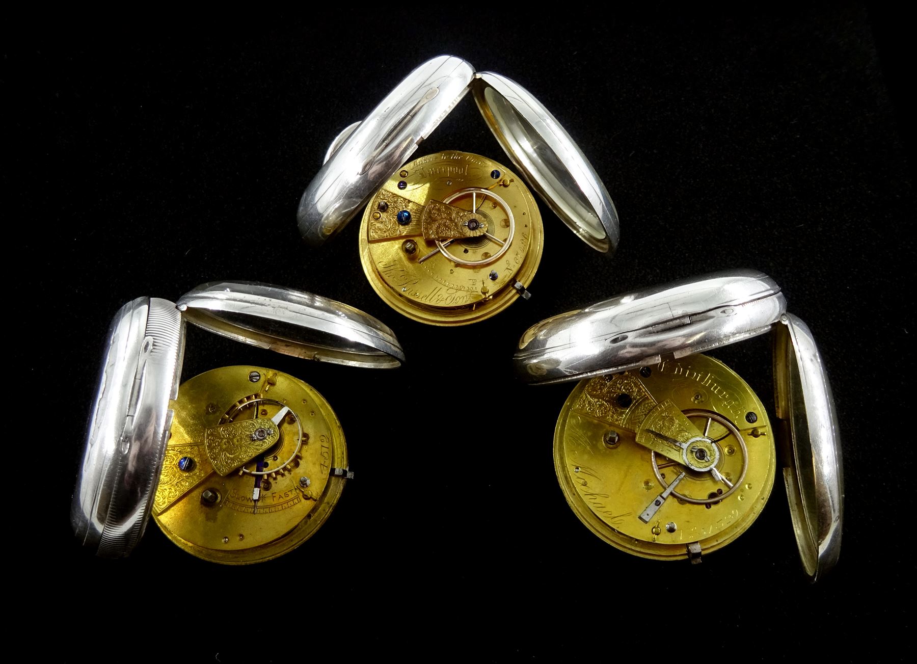 Victorian silver open face English lever fusee pocket watch by Thomas Russel & Son, Liverpool, No. 67496, engraved balance cock with diamond endstone, white enamel dial with Roman numerals and subsidiary seconds dial and two other similar Victorian silver pocket watches, one by M Michael, Edinburgh, all hallmarked (3) 