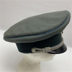 WW2 German Infantry Officer's visor cap with cloth insignia; labelled and stamped Offizier Kleiderkasse Berlin and Erel Stirnschutz