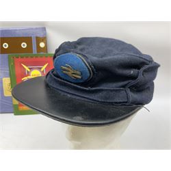 Black painted three colour railway lamp with revolving filters, H29cm; BR Acme Thunderer whistle; three railway peaked caps, two with BR Intercity 125 badge; small album of photographs of railway interest etc