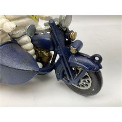 Cast iron figure of Michelin Man on motorbike modelled with smaller seated Michelin man in side car, H16cm