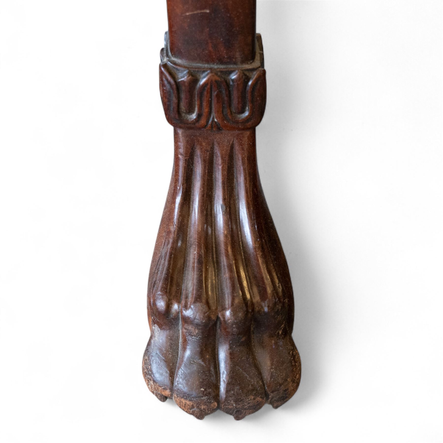 William IV mahogany and brass-inlaid marble serving table, the rectangular marble top featuring yellow tones, bordered by inlaid coloured marble bands in red and black, the frieze with brass-inlaid Boulle-inspired foliate panels on ebony, lower edge with beaded moulding, front legs inlaid with a stripped band of coromandel above carved acanthus leaves, tapering to carved lion paw feet, circa 1830