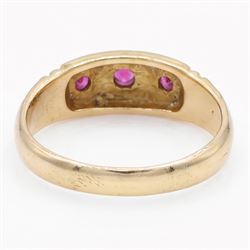 Victorian gold ruby and diamond gypsy ring, three round cut rubies spaced by two star set round cut diamonds, stamped 18ct