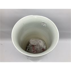 Chinese floor vase of cylindrical form decorated in blue, white and red wih birds perched upon blossoming branches, with flared rim, H62cm