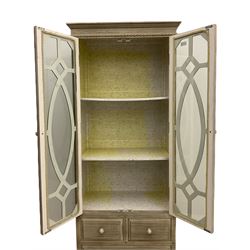 Distressed painted cabinet, fitted with two glazed doors above two short and two long drawers