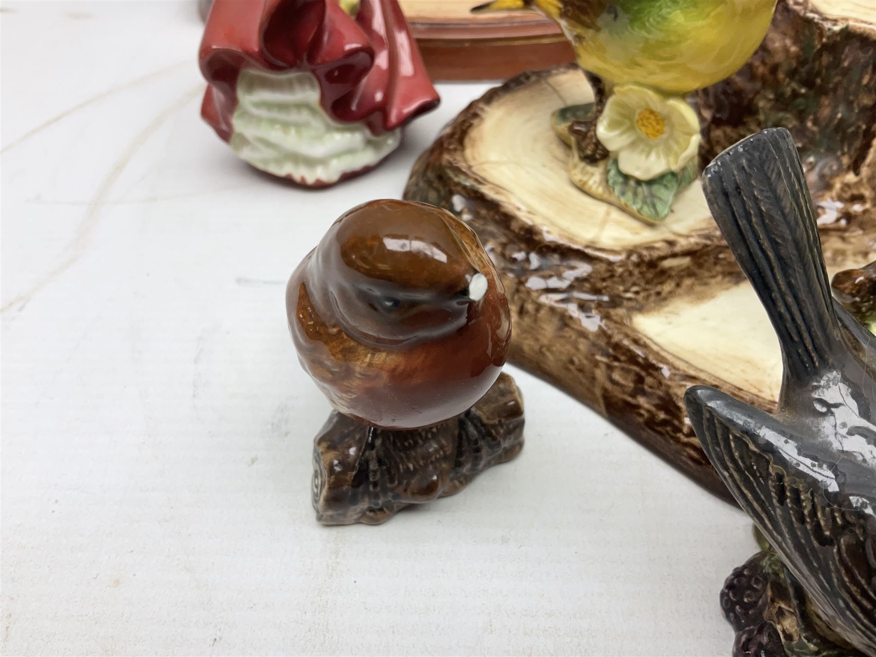 Nine Beswick bird figures, with stand, together with USSR thrush, two Franklin Mint Jane Austin figures and four Royal Doulton figures 