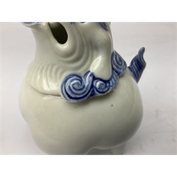 Japanese Hirado blue and white porcelain censer in the form of a Lion Dog, together with a Hirado porcelain shell shaped dish, centrally decorated with an exotic bird flanked by two roundels on floral scroll ground, censer H13cm