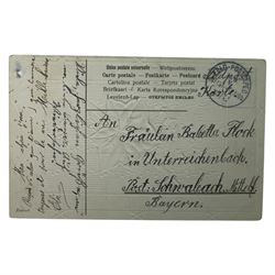 WWI German family grouping ephemera, including photographs, hand written postcards, military passport, Military Anti tank training book  