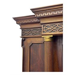 19th century mahogany sideboard, raised mirror back with carved fretwork and two fluted columns, above two cupboards and two drawers with lion mask handles