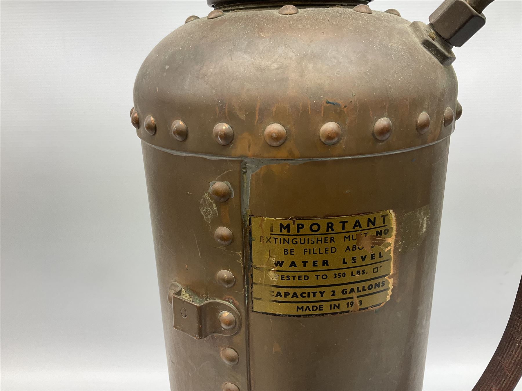 Large copper ‘Waterloo’ fire extinguisher by Read and Campbell Ltd and another Safex example 
