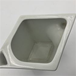 Royal Doulton Guinness advertising whiskey water jug, circa 1930s by Robert Porter and Co. of lozenge angled form, decorated with the  bulldog Guinness, H11cm