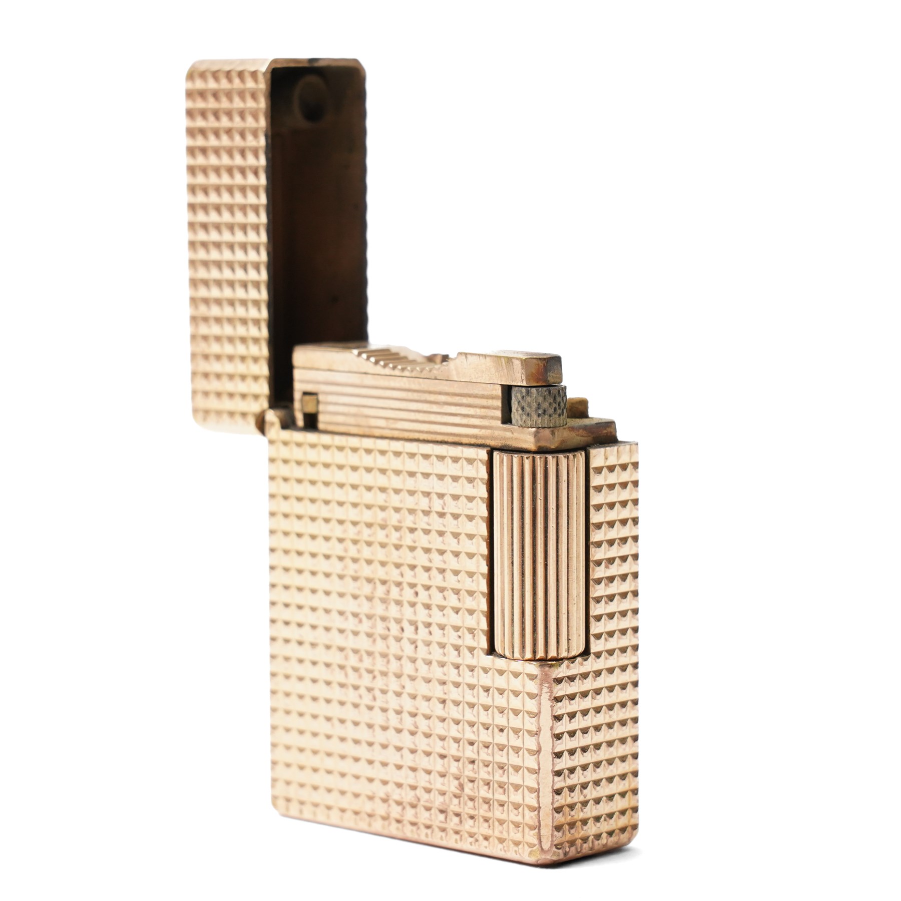S.T. Dupont - gilt metal pocket lighter, rectangular form with all-over engine-turned diamond decoration and reeded thumbpiece, stamped S.T. Dupont Paris, Made in France, with original fitted box
