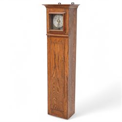 John Whitehurst of Derby- late 19th century oak cased wall hanging Noctuary or night watchman's wall clock, in a rectangular case with a moulded and glazed door to the dial and full length trunk door, with a silvered circular dial and a brass indicating pointer, Arabic numerals and quarter hour track with steel time recording pins, four wheel chain driven going train. No pendulum,chain or weight.    
John Whitehurst is one of the most prolific makers of these distinctive early type of night watchman's clocks, used predominantly in industrial premises, factories and mills in the north west of England during the 19th century.