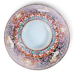 Benjarong bowl, the sides painted with alternating images of the Buddhist figures on a black ground embellished with flames, H8cm D15cm