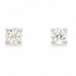 Pair of platinum diamond earrings, each stud four claw set with a single round brilliant c...