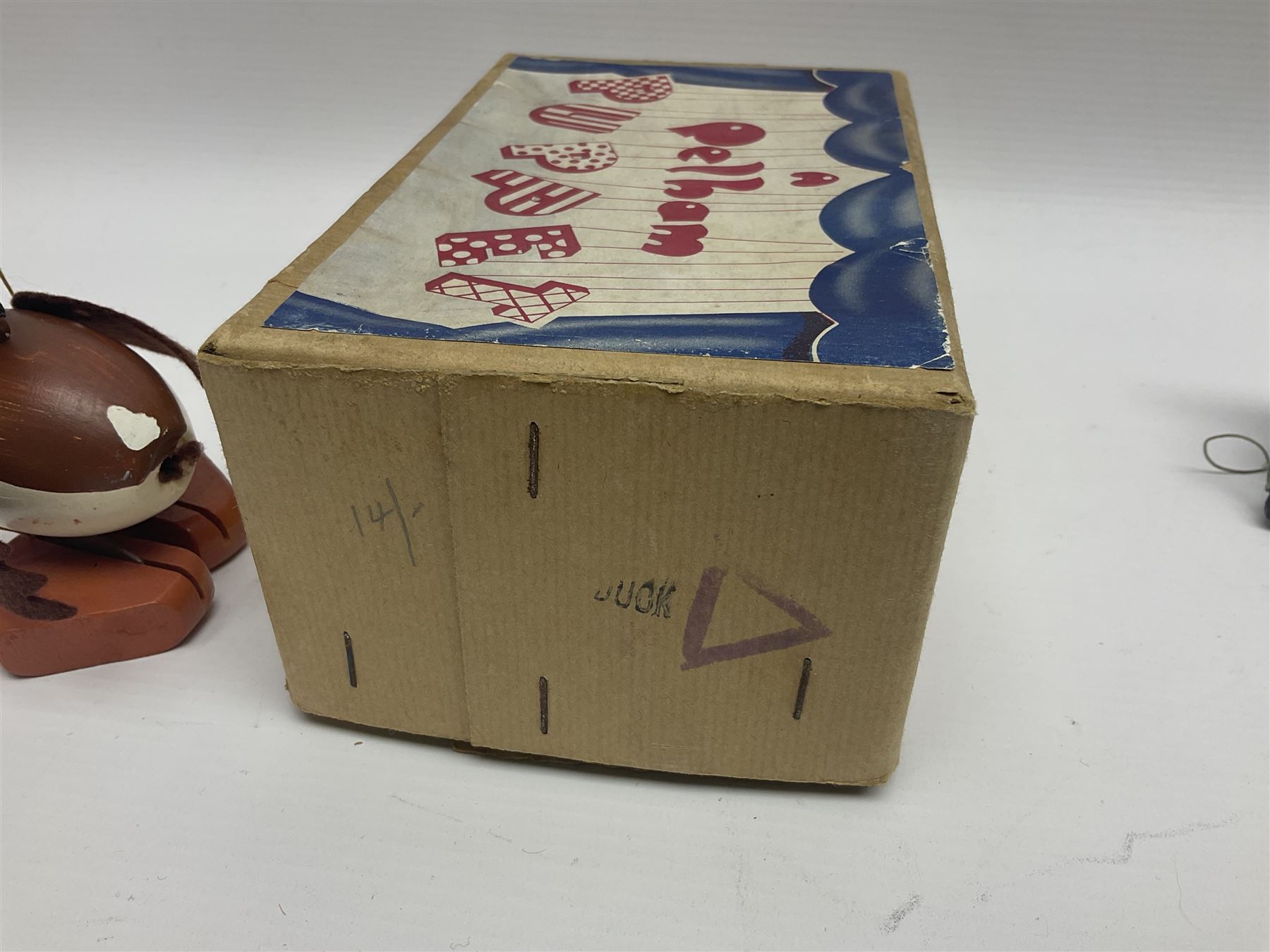 Pelham Puppet - three puppets comprising a painted wooden duck with felt mouth and wings with metal joints H12cm, in original box and instructions; and two further examples Type A cat with a hollow body H12cm, and a boy H23cm (3) 