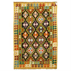 Maiman kilim runner, woven with staggered diamond medallions in rich teal, purple, mustard...