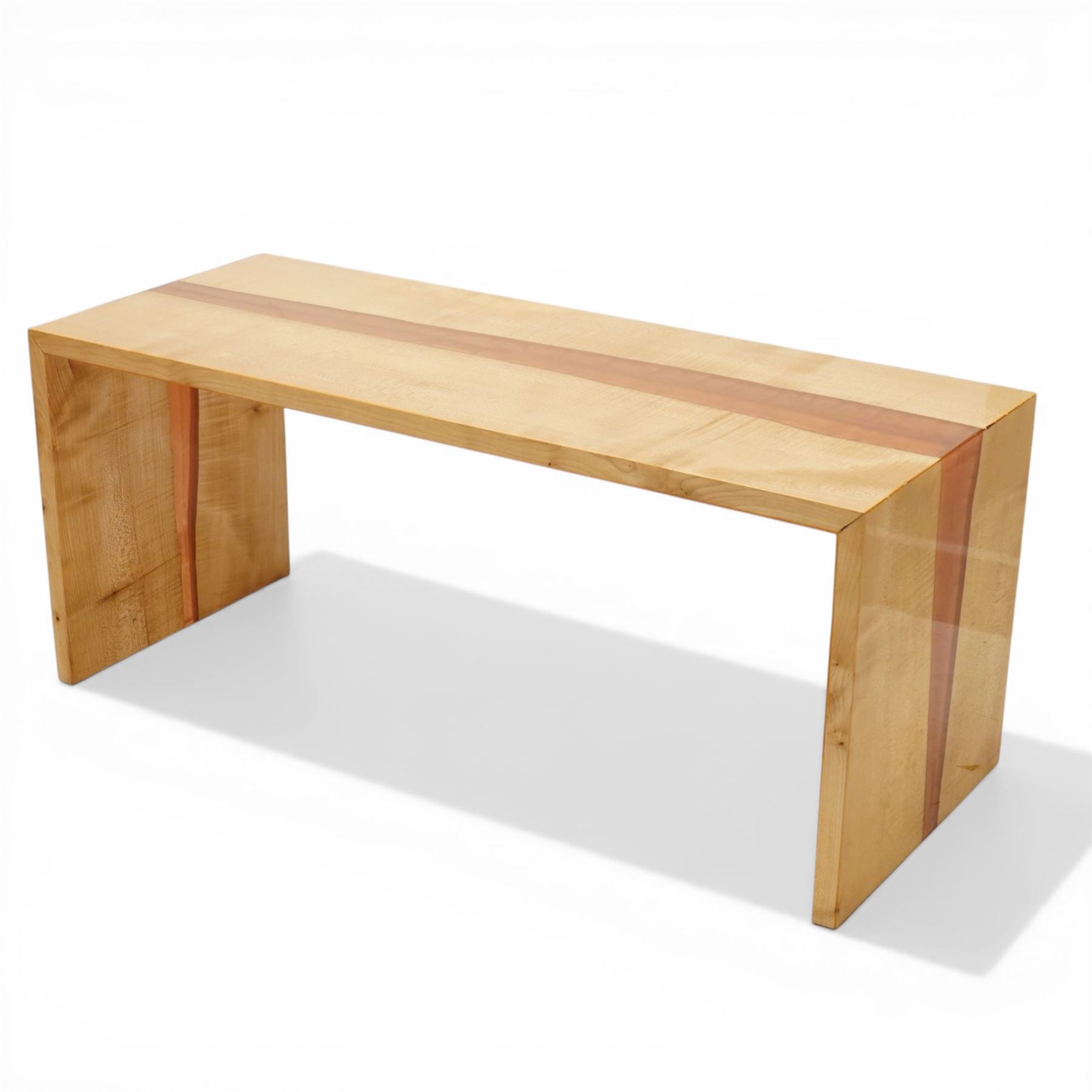 Chris Redfearn of Halifax - sycamore coffee table, the rectangular top with resin flare, raised on rectangular twin end supports