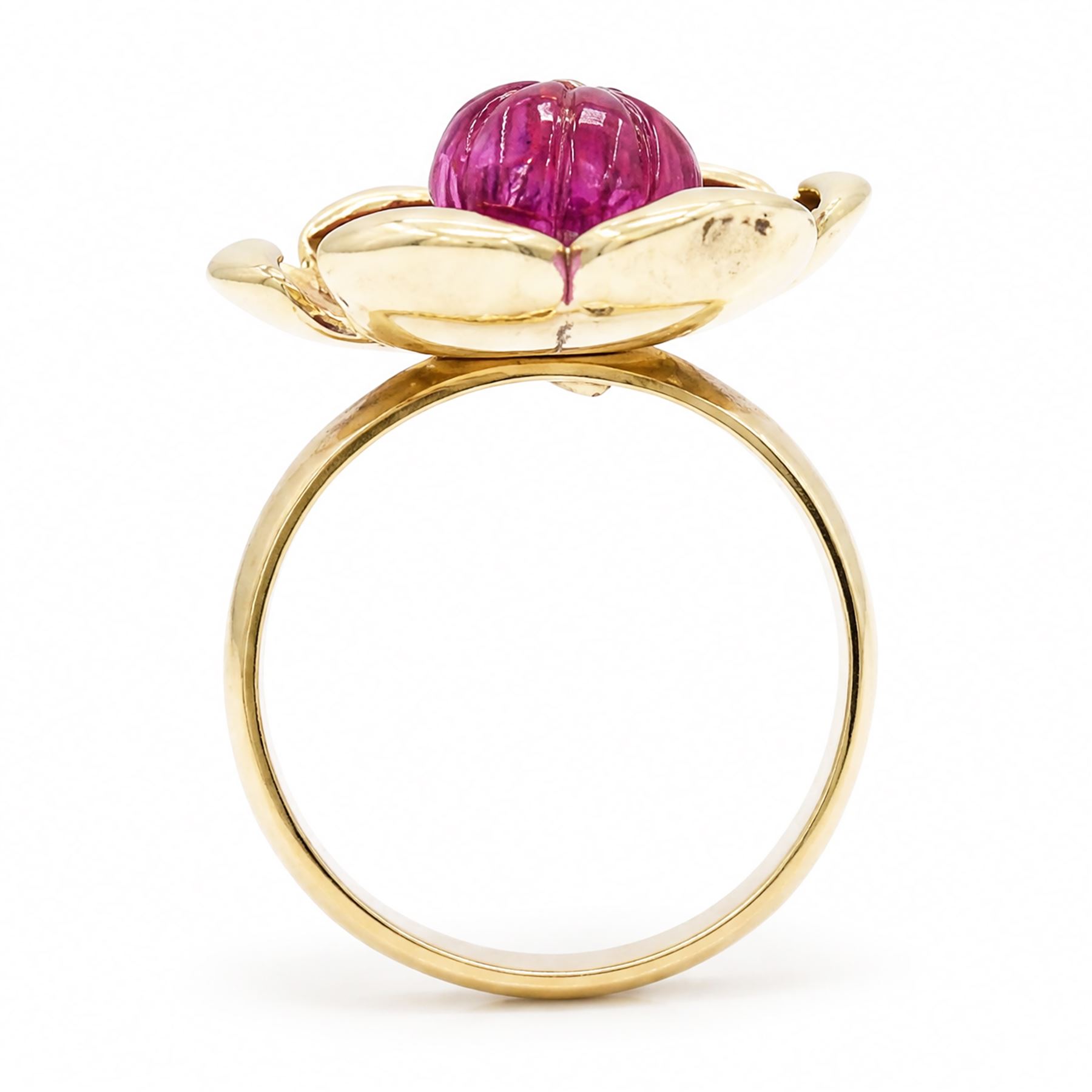 14ct gold ruby and diamond flower head ring, carved ruby set with a single round brilliant cut diamond, on a 9ct gold shank, hallmarked