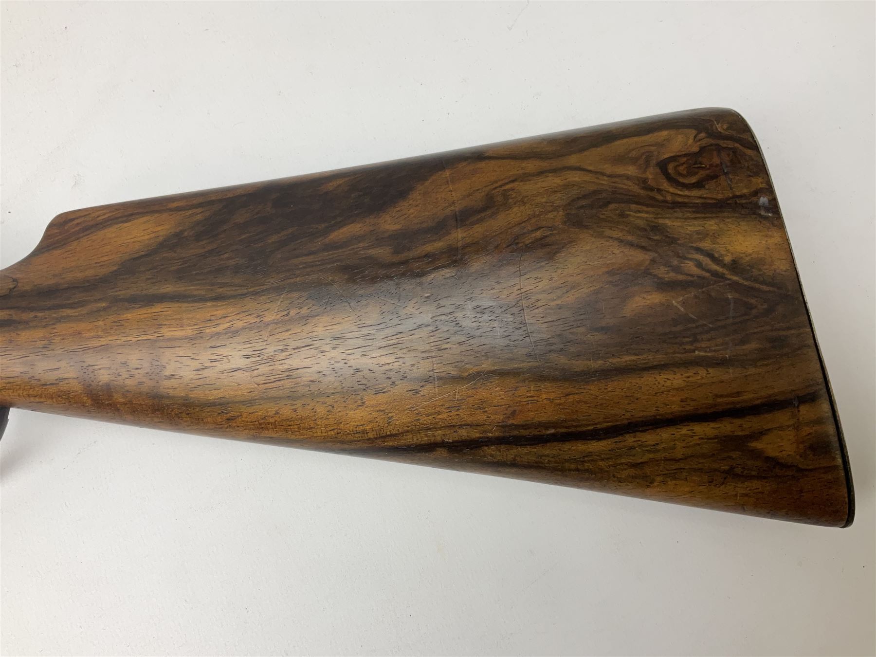 Manton .577/450 Martini Henry rifle, the 82.5cm smooth bored barrel proofed for shot, two barrel bands and bayonet fitting, engraved action with side safety, figured walnut stock with chequered steel butt plate, complete with ramrod, NVN other than 5346 on barrel, L125cm