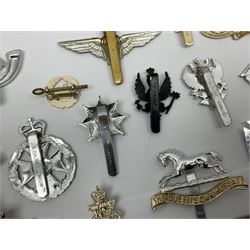 Military badges - approximately eighty predominantly staybrite glengarry, cap and collar badges and small quantity of plastic badges