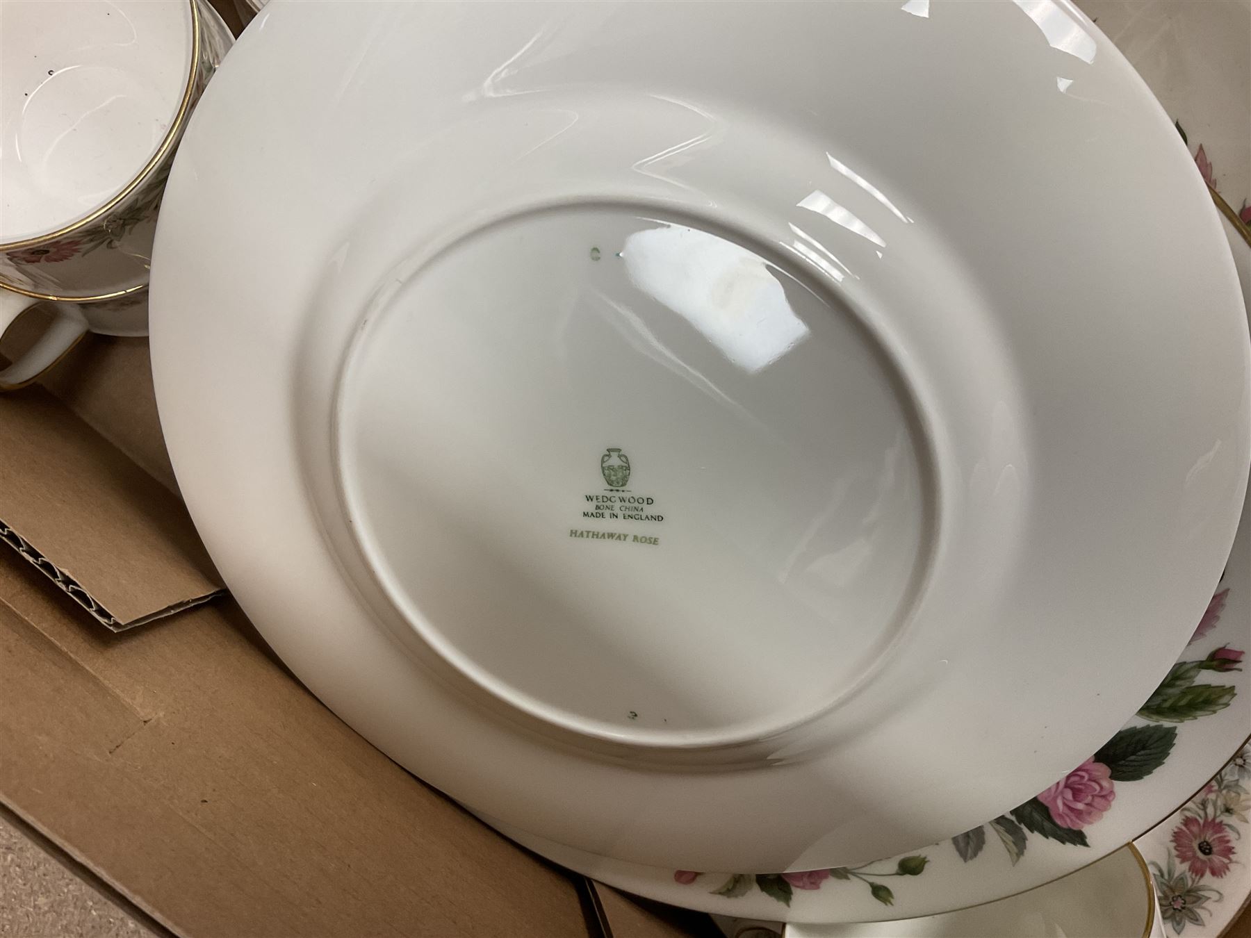 Paragon part dinner service in Belinda pattern, including teapot, six tea cups and saucers, dinner plates etc, together with Royal Doulton part tea service in Carnation pattern, Wedgwood part tea service in Hathaway Rose