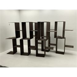 Retailed by The Conran Shop - four sectional modular shelving units, rusted metal finish, each unit - W212cm, H71cm, D33cm