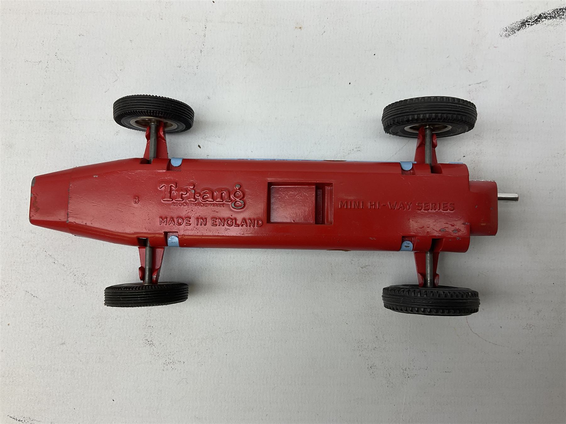 Various makers - Tri-ang Mini-Hi-Way Racing Car Series Le Mans No.9 racing car; Matchbox K-15 Merryweather Fire-Engine; Marx tin-plate Friction Helicopter; all boxed; and a Minic Motor Rally Adventure box containing a Jaguar Police car for spares or repair (4)