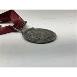 WW2 German Eastern Front Medal awarded to those who served on the German Eastern/Russian Front during the Winter Campaign period of 15th November 1941 to 15th April 1942 with original ribbon; and German War Merit Cross with swords 2nd Class (2)