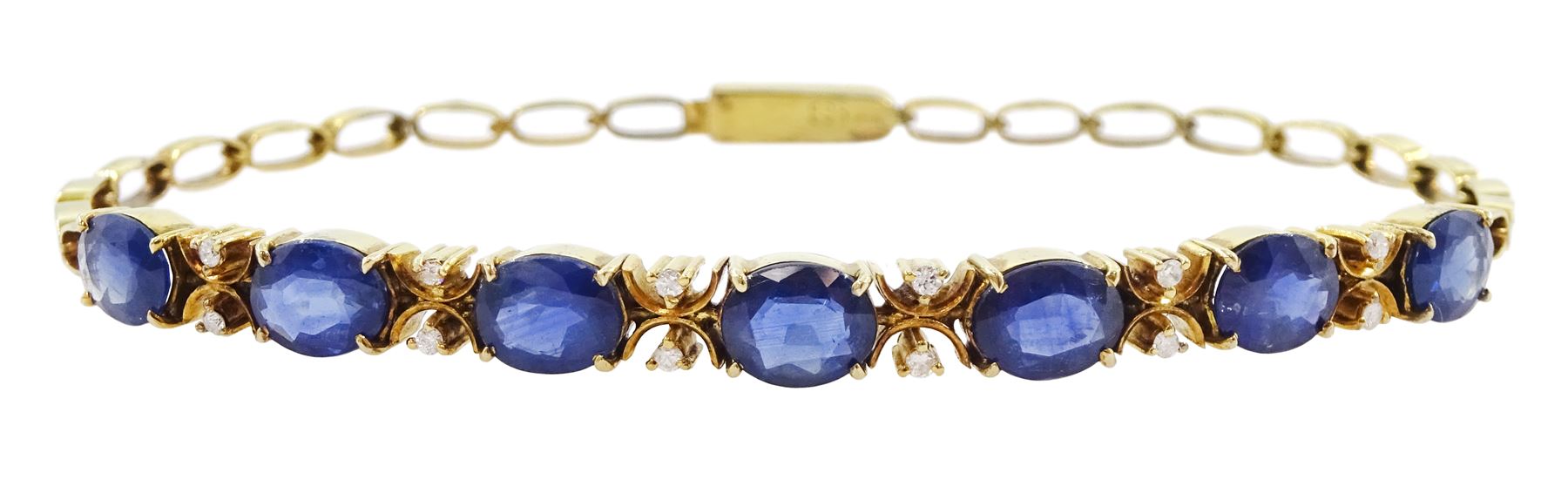 14ct gold oval cut sapphire and round brilliant cut diamond bracelet, stamped 585