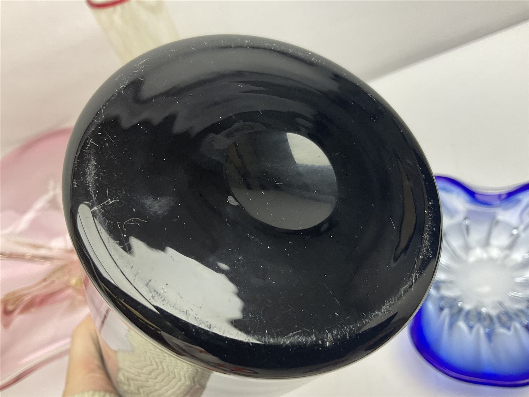 Two Whitefriars glass jugs, together with a Swedish Pukeberg art glass vase and three art glass bowls, including large pink example, some signed to base, tallest H30.5cm